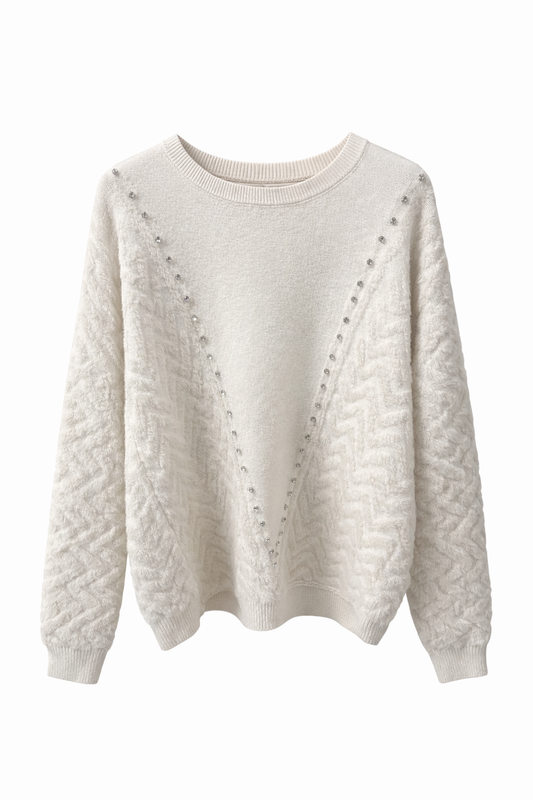 wit kleurige trui met structuur en subtiele pareldetails